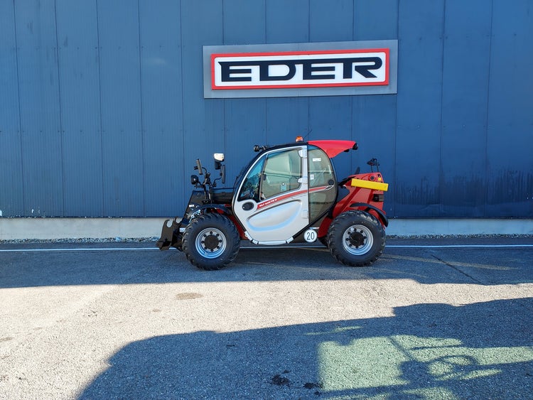 Seitenansicht links des Manitou MLT 625 75K H ST5 S1 mit Kabine und Schnellwechselaufnahme.